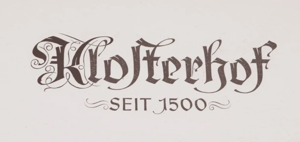 Text reading "Klosterhof Seit 1500" in ornate script on a plain background.